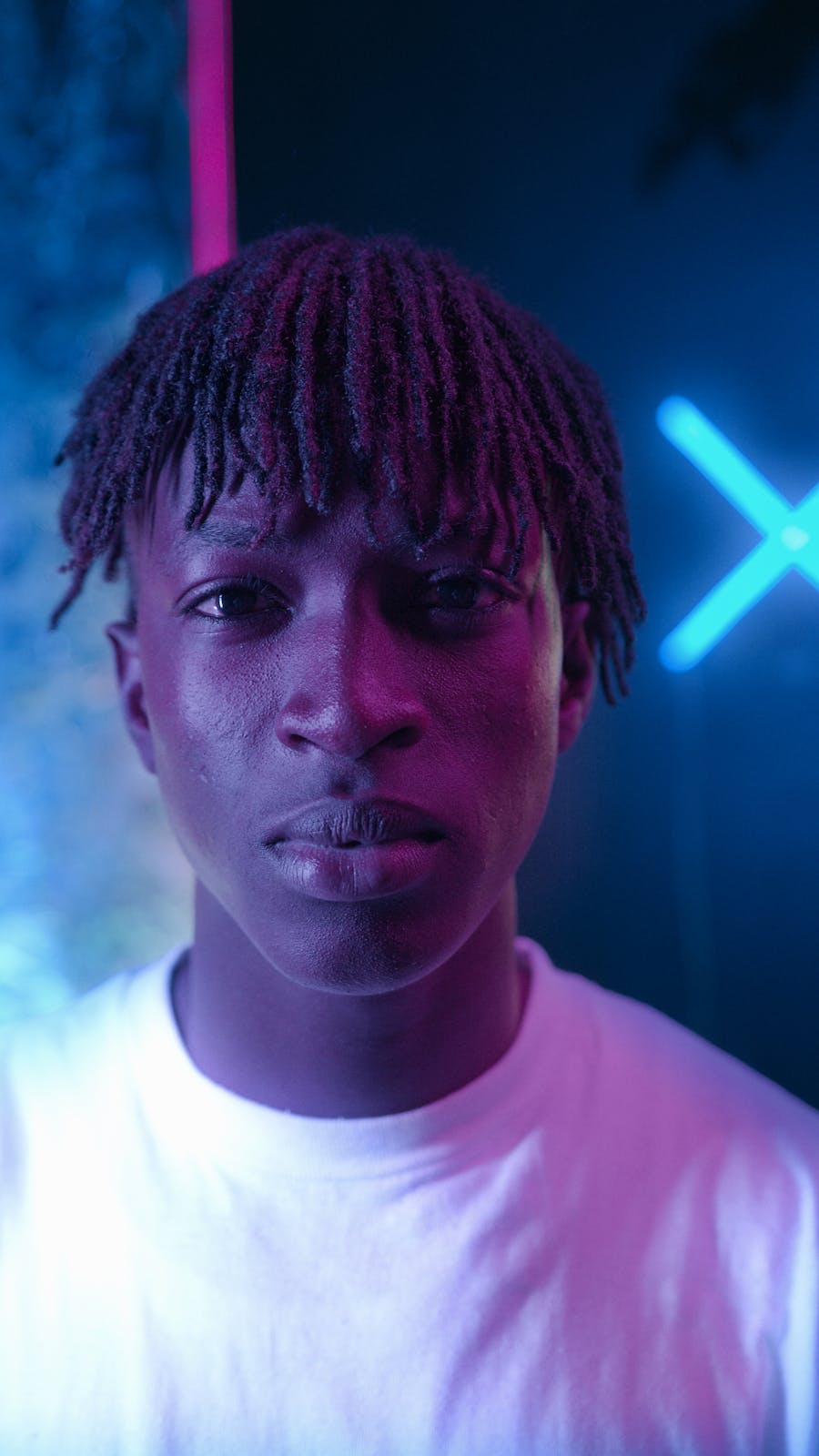 Sample portrait of a young man with colorful lighting